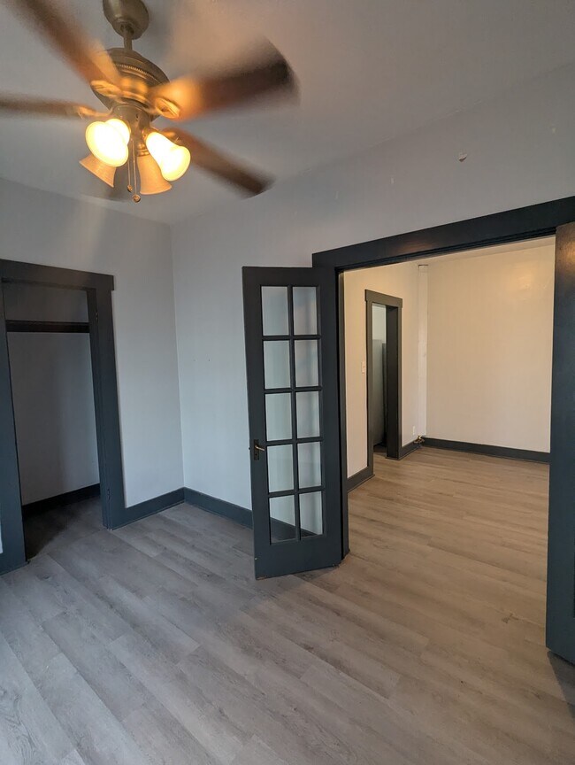 Front Bedroom wit Double Doors - 211 W 10th Ave