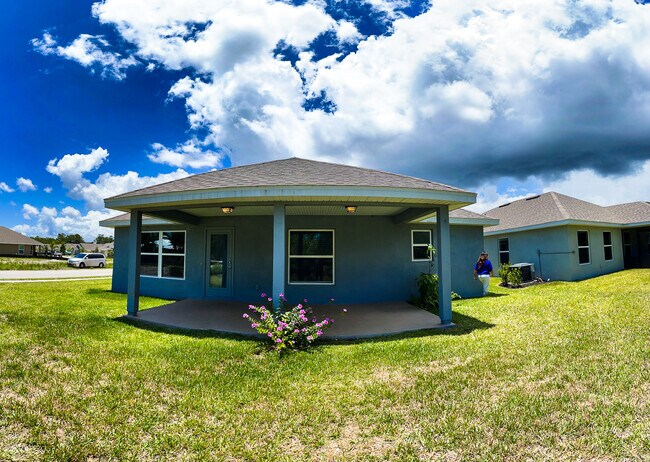 Building Photo - 825 NE Whistling Duck Way
