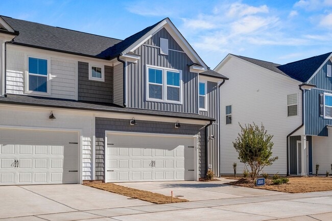 Building Photo - BRAND-NEW TOWNHOME-PRICE REDUCED!  Close t...