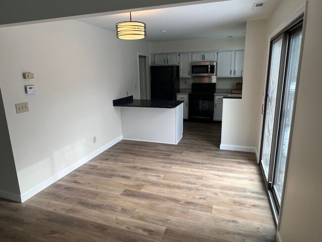 Building Photo - Renovated Savoy Condo - Available NOW