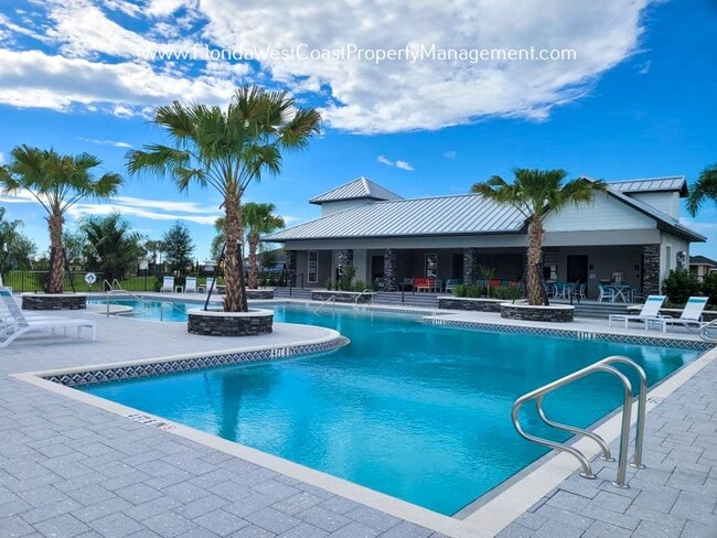 Building Photo - OUTSTANDING NORTH RIVER RANCH HOME! 4 BEDR...