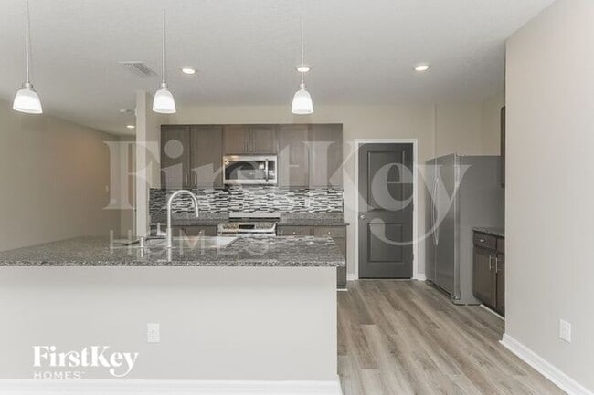 Building Photo - 7944 Pelican Reed Cir