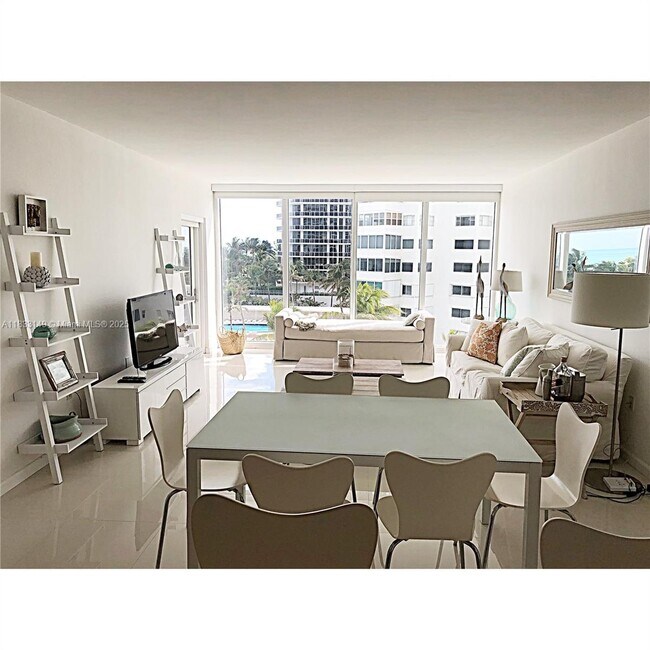Building Photo - 10275 Collins Ave