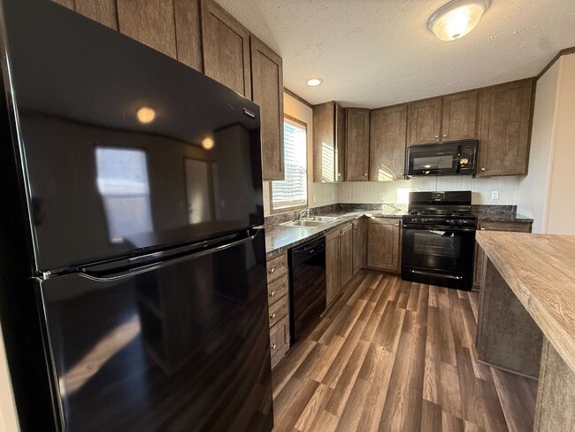 Building Photo - 12403 St Michel Ave