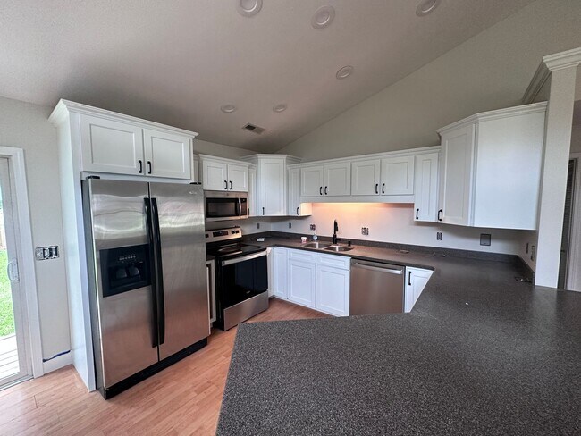 Building Photo - Remodeled Three Bedroom Home