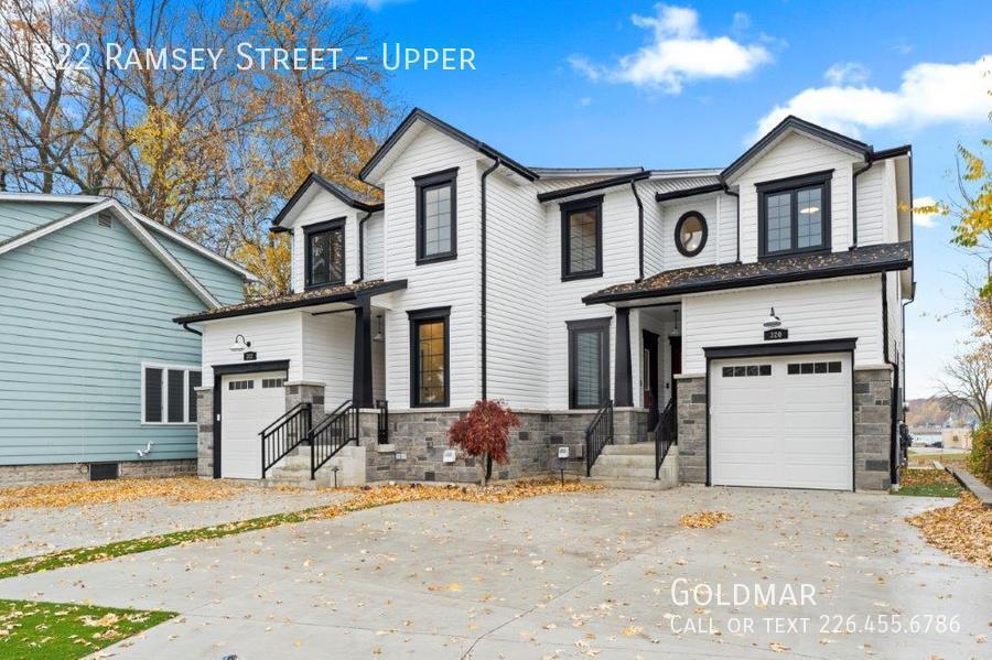 Primary Photo - Stunning 2 level home with water views ava...