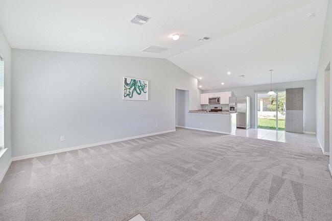 Building Photo - Spacious Three-Bedroom Home with Open Floor Plan, Large Yard