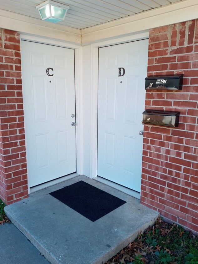 Entry door to apartments. - 9901 E 12th St