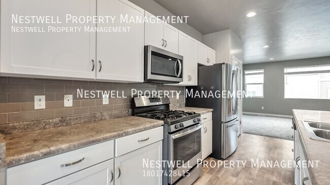 Building Photo - Incredible 4-bed Three-Story Townhome in S...