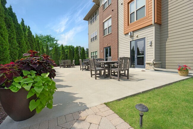 Áreas de parrilla y picnic de The Woodlands - The Woodlands Apartments