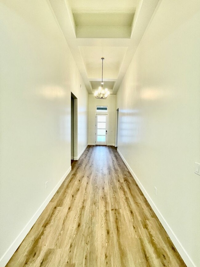 Building Photo - BRAND NEW Three Bedroom Home in Desert Cliffs