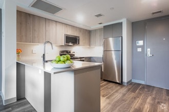 Building Photo - The Melnea Residences