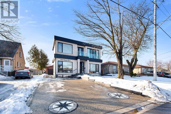 Photo du bâtiment - 7160 Justine Dr Ave