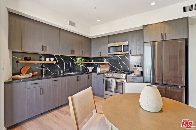 Foto del edificio - 1110 Spaulding Ave