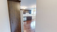 Located at 550 Park Ave W in Chatham-Kent, Ontario, this well-appointed 2-bedroom, 1-bathroom unit offers a comfortable and functional single-floor layout. Warm hardwood-style flooring flows consistently throughout the entire space, lending a cohesive and inviting feel to every room.

The kitchen is a standout feature, showcasing rich dark wood cabinetry, granite countertops, a classic subway tile backsplash, and a full suite of stainless steel appliances including a refrigerator, electric range, built-in microwave, and dishwasher. Adjacent to the kitchen, the dining area benefits from large windows that usher in natural light and outdoor views of the surrounding neighbourhood.

The primary bedroom is a generously sized retreat, featuring a tray ceiling and a sliding glass door that opens to a private balcony with pleasant outdoor views. A spacious walk-in closet with wire shelving systems provides ample organized storage. The second bedroom is equally bright, with a large window overlooking the neighbourhood.

The bathroom is clean and functional, complete with a full soaker tub and shower combo, granite vanity countertop, and white cabinetry. A double sliding-door closet near the entry adds further storage convenience. Neutral toned walls throughout keep the space feeling bright and move-in ready.
