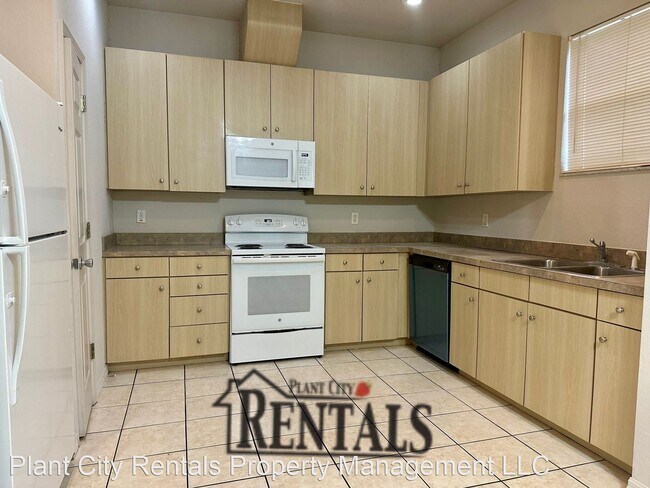 Building Photo - 3 br, 2.5 bath House - 3617 W. Reynolds Ap...