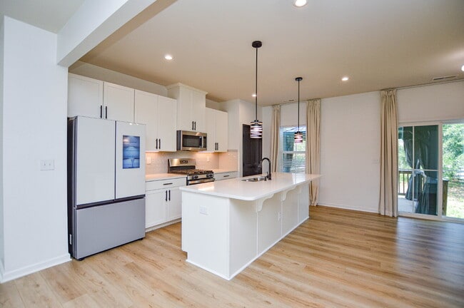 Building Photo - 3 Bedrooms | 2.5 Bathrooms | Lower-Level Flex Room | Approximately 1,978 Square Feet | 2-Car Gara...