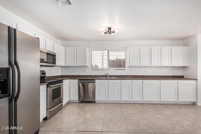 Foto del edificio - 11836 W Rosewood Dr