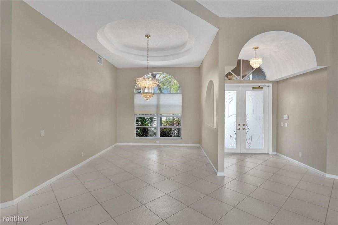 Foto principal - 5 br, 3.5 bath House - 8344 NW 43rd St