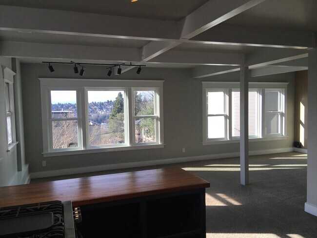 The dining area, living area at right. - 1929 10th Ave W