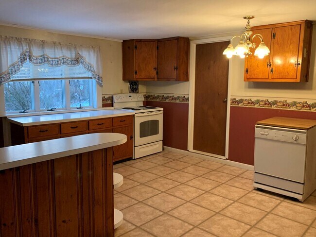 Foto del edificio - Multi-level 3-bedroom, 1-bath single-family home