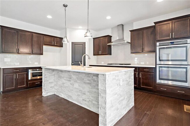 Building Photo - 4180 Woodwind Dr