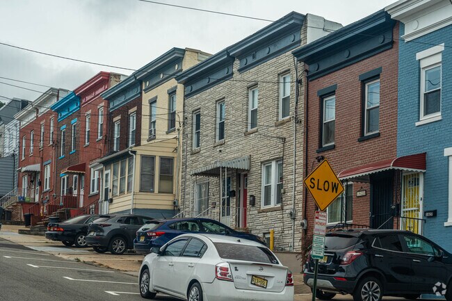 Row homes of various colors and finishes are common in Fairview.