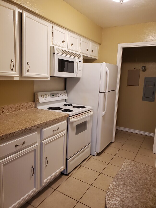 Kitchen open to living and dining space - 5809 Lake Hubbard Pky
