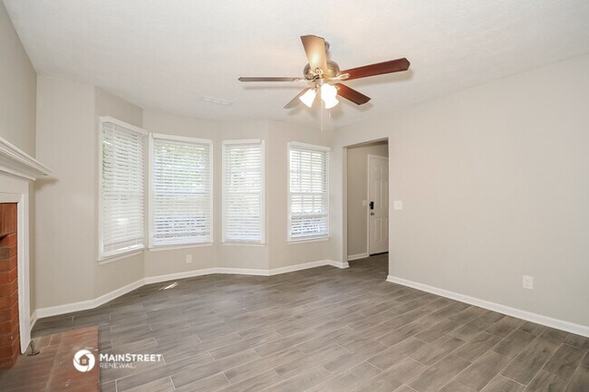 Building Photo - 6725 Songwood Dr