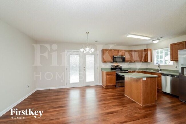 Foto del edificio - 5709 Hidden Lake Dr