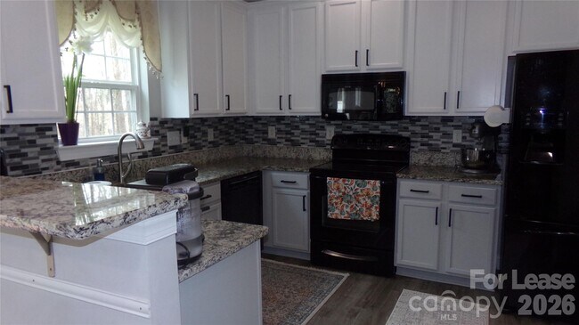 Foto del edificio - 10418 Glenmeade Rd