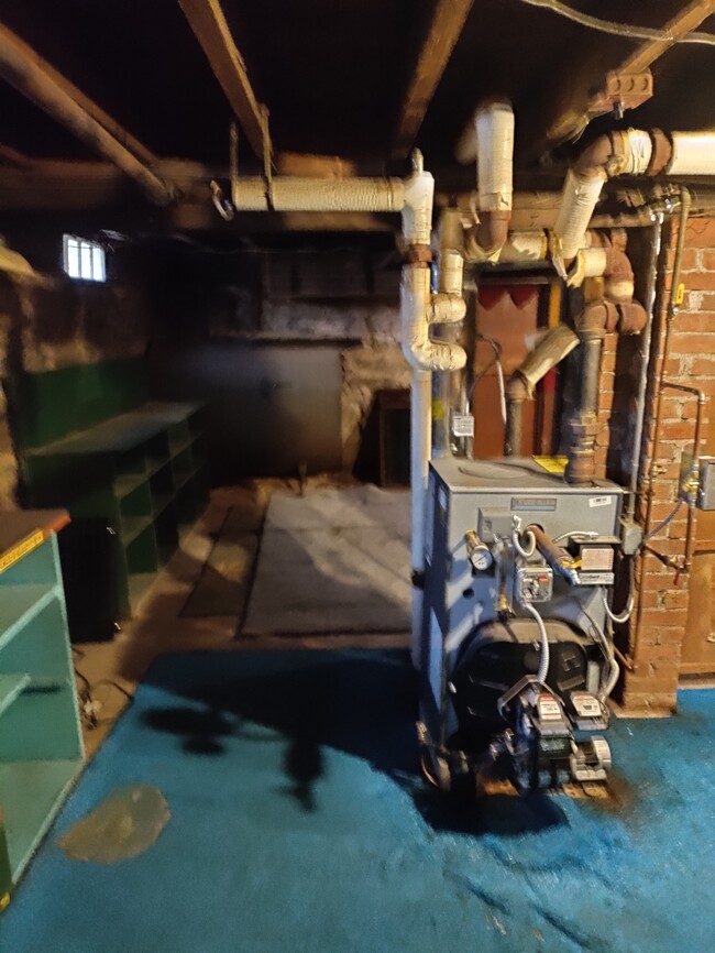 Boiler and oil tank located in the basement - 110 Walnut St