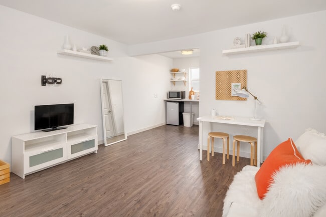 Furnishing included: table, pull-out couch, tv stand, mirror, chairs, night stands, shelves, and some decor - 8801 Aurora Ave N