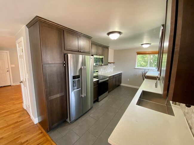 Building Photo - University Gem with Spacious Yard & Garage...