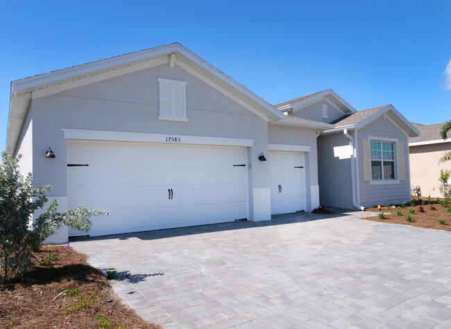 3-Car garage with epoxy floor - 17583 Palmetto Pass Ln