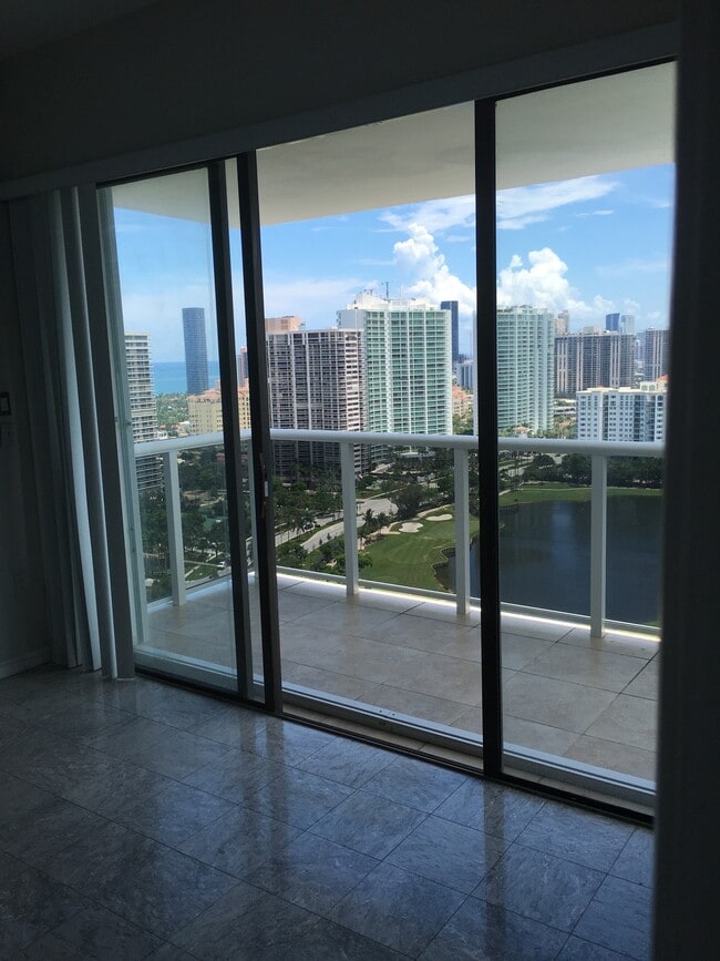 Building Photo - 3675 N Country Club Dr