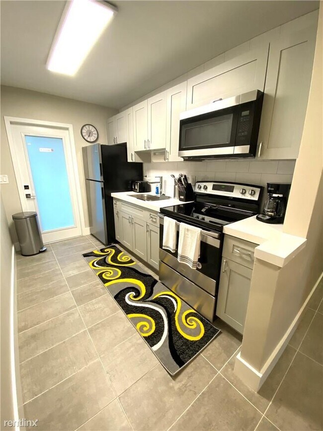 Foto del edificio - 3 br, 2 bath  - 1107 NW 7th Ave