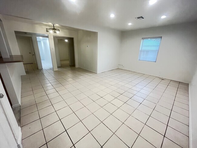 Living room and dining area - 1706 E Grant Rd