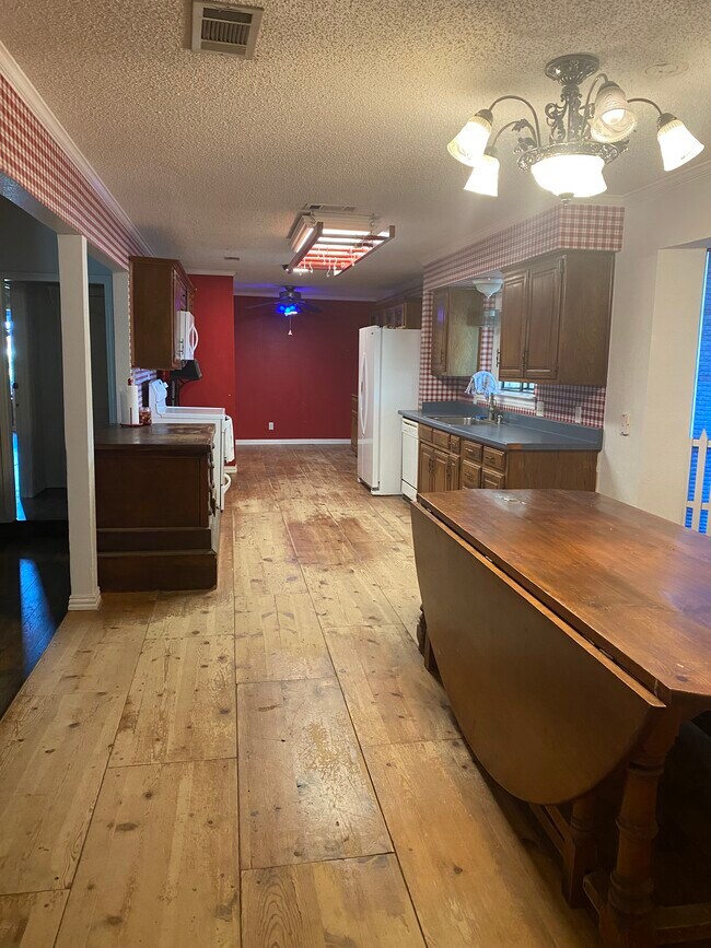 View of kitchen from entry way - 8040 Vista del Sol St