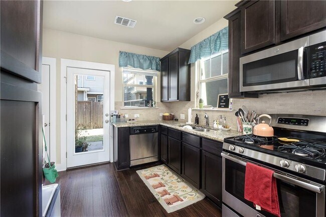Building Photo - 7424 Easy Wind Dr