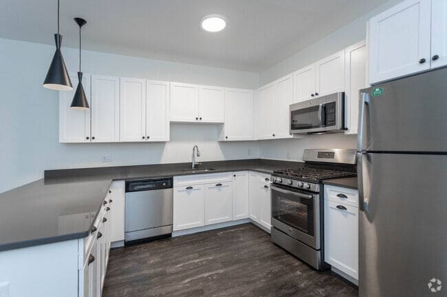 1BR,1BA -689SF - Upper - Kitchen - Greymore Flats