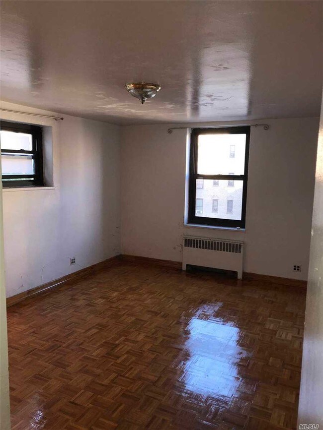 Building Photo - 86-15 Dongan Ave