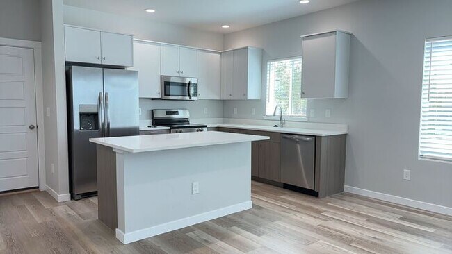 Foto del edificio - Roe Street Townhomes