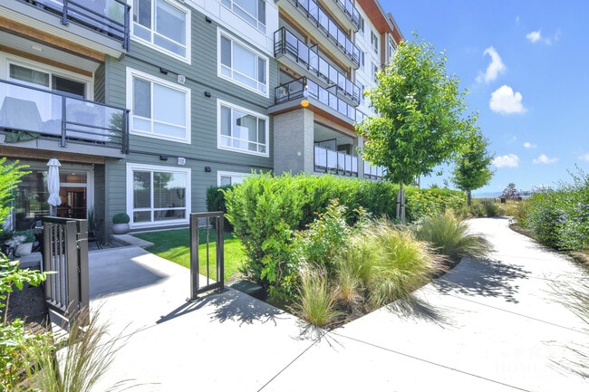 Building Photo - Fully Furnished 1 Bedroom Condo at Salt & Meadow — Walk-Out Backyard, Water Views & Resort-Style ...
