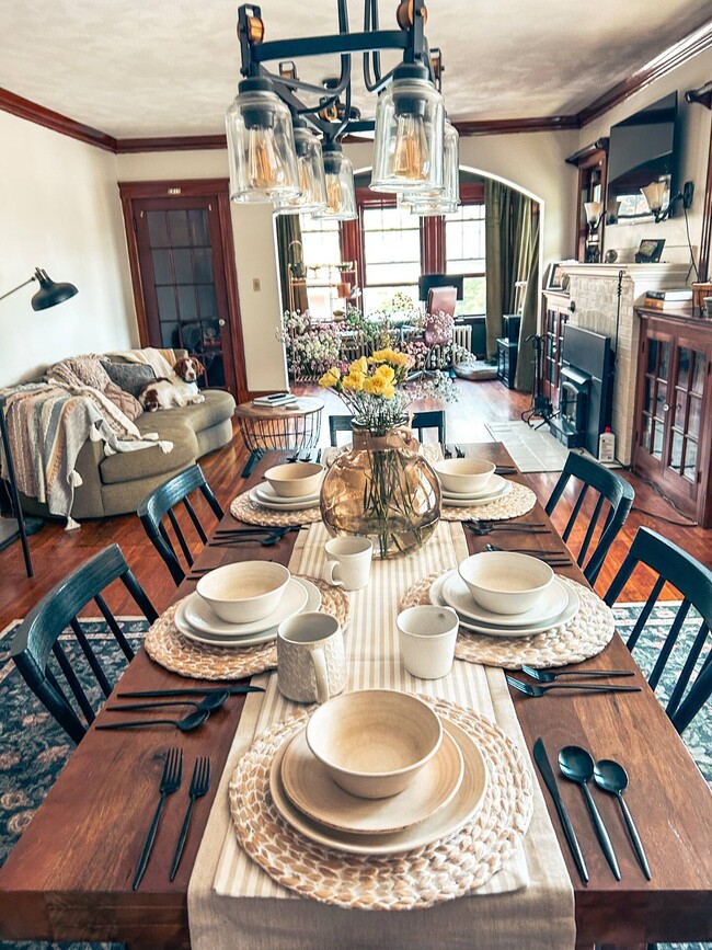 Enjoy the wooden dining room table which can fit six people. - 186 Linwood St