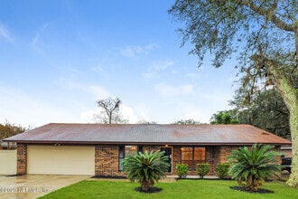 Building Photo - 6353 Tree Top Cir W
