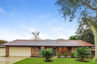 Building Photo - 6353 Tree Top Cir W