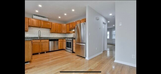 Building Photo - 451 E 8th St