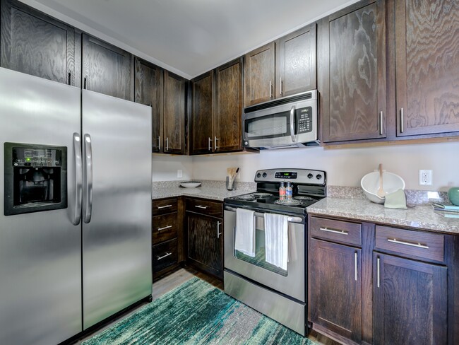 Kitchen with Ample Storage - Creekstone at RTP Apartments