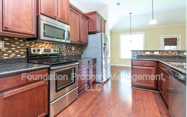 Foto del edificio - 5505 Riverstone Dr